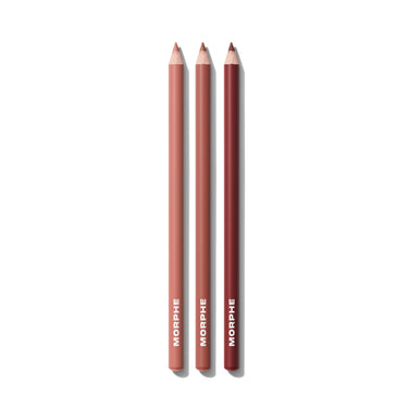 Three Morphe lip pencils on a white background