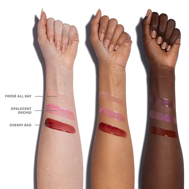 Three swatches of lipsticks on different skin tones with labels.