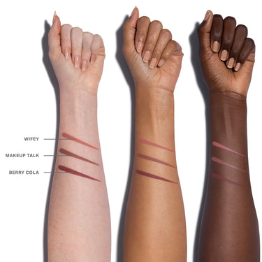 Three arms with different skin tones displaying lipstick swatches labeled 